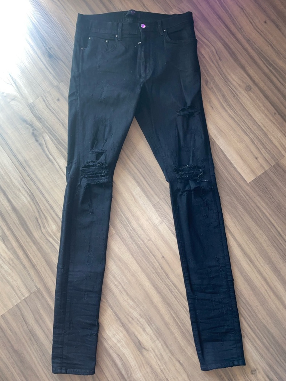 AMIRI Black distresed Skinny Jeans with Branded Button size 33